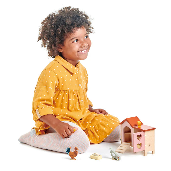 Child playing with Tender Leaf Toys Chicken Coop – educational wooden farm toy for toddlers - Grace and Fox